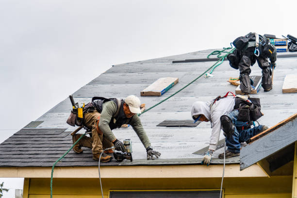 Professional Roofing technician working in Garwood, TX